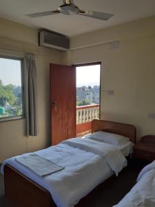 Katil atau katil-katil dalam bilik di Hotel Vibe by Solitary