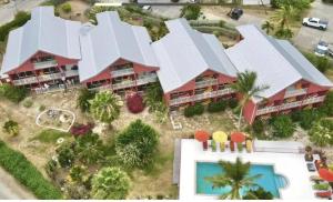 an aerial view of a resort with a pool at Happy studio Orient bay Palm court Residence in Orient Bay