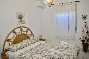 Postel nebo postele na pokoji v ubytování Villa Rosetta vacanze al mare