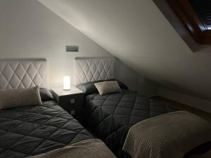 Ένα ή περισσότερα κρεβάτια σε δωμάτιο στο Apartamento en Centro de Córdoba