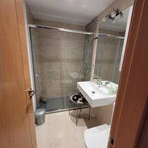 a bathroom with a sink and a shower at Apartamento Castillo Bajo in Torrox Costa