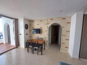TV a/nebo společenská místnost v ubytování BAHIA Sea View Exclusif pour Famille