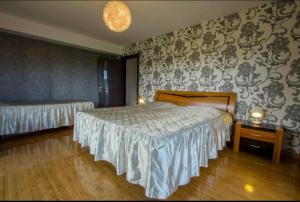 Voodi või voodid majutusasutuse RED HOUSE toas