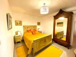 En eller flere senger på et rom på Quinta das flores