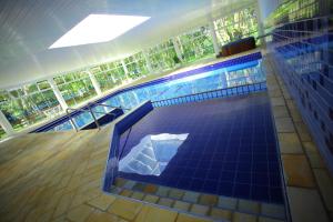 Bazén v ubytování Hotel Termas Gravatal nebo v jeho okolí