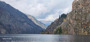 a large body of water between two mountains at Ocean hostel in Osh