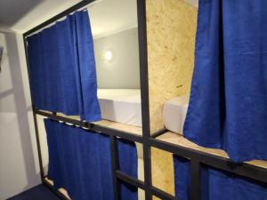 Letto o letti in una camera di Gallary Hostel