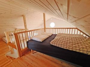 Postel nebo postele na pokoji v ubytování Nysted Strand Camping & Cottages