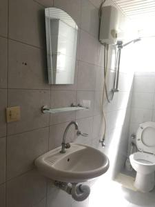 a bathroom with a sink and a toilet at Furnished Apartment [Mounthly Discount] D4 in Antalya