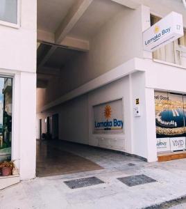 a store front with the entrance to a building at Palm Sea Suite 17 in Larnaka