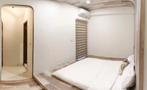 Postel nebo postele na pokoji v ubytování 墾丁堡雅1號 電梯包棟民宿
