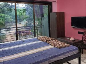 Μια τηλεόραση ή/και κέντρο ψυχαγωγίας στο KHOT HOLIDAY HOMESTAY