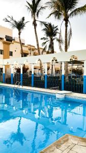 Πισίνα στο ή κοντά στο Chic 3-BR Tala Almajd Villas in upscale district Alnahdah Family only