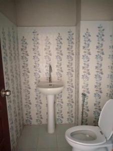 Ett badrum på V House
