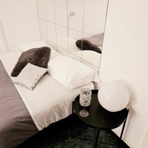 Llit o llits en una habitació de Citylife Fiera apartment