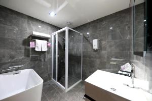 Vannituba majutusasutuses Wen Sha Bao Motel-Xinying