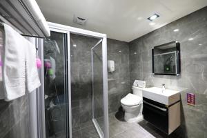 Vannituba majutusasutuses Wen Sha Bao Motel-Xinying