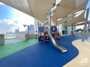 a playground on the roof of a building at Stunning 2Bedroom with balcony Dubai Mall access in Dubai