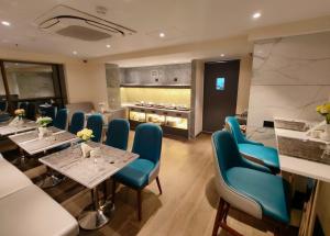Area soggiorno di Maxxvalue Hotel MIDC - Andheri