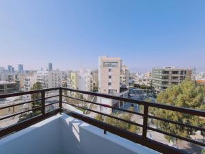 a balcony with a view of the city at STAY Kallipoleos Apartment in Nicosia