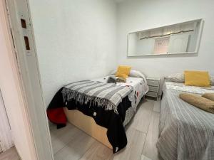 Posteľ alebo postele v izbe v ubytovaní CG131 - Centro 50 metros, Playa 650 metros, Wifi, Fire Stick Amazon