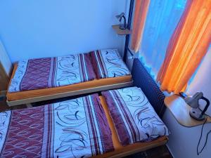 Postel nebo postele na pokoji v ubytování privat kobr