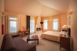 Postel nebo postele na pokoji v ubytování Armonia Resort