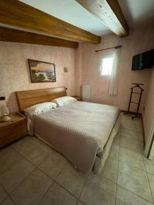 Letto o letti in una camera di La Maison de Luisa