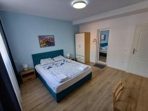 Ένα ή περισσότερα κρεβάτια σε δωμάτιο στο Fenix Family Hotel