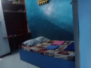 Säng eller sängar i ett rum på Casa Minha Backpackers Hostel