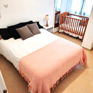 Postel nebo postele na pokoji v ubytování Apartamentos en El Payo Salviva + 28 fotografií