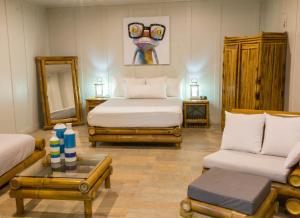 Posteľ alebo postele v izbe v ubytovaní Hotel Plaza Yara