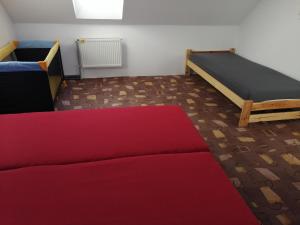 Postel nebo postele na pokoji v ubytování Apartmány U Krumlova