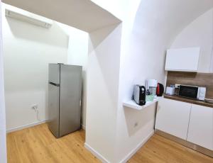 Kuchyň nebo kuchyňský kout v ubytování Morfeo B&B