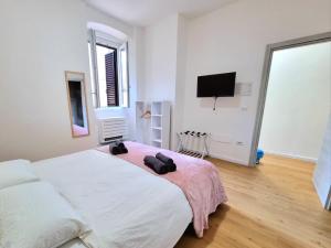 Postel nebo postele na pokoji v ubytování Morfeo B&B