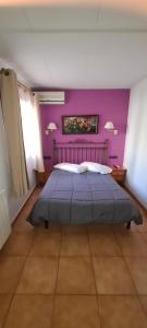 Posteľ alebo postele v izbe v ubytovaní Hostal Mont-Rock