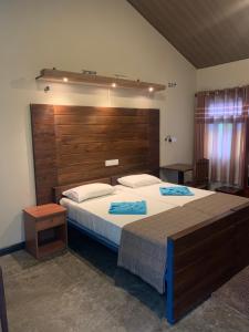 Postel nebo postele na pokoji v ubytování Pub Ceylon Hostel