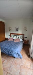 Posteľ alebo postele v izbe v ubytovaní Hostal Mont-Rock