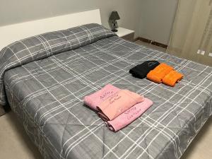 Łóżko lub łóżka w pokoju w obiekcie Aurora casa vacanze