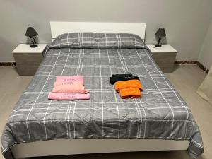 Łóżko lub łóżka w pokoju w obiekcie Aurora casa vacanze