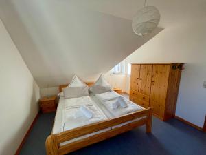 Ένα ή περισσότερα κρεβάτια σε δωμάτιο στο Ferienhaus Sonnenglück