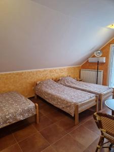 Postel nebo postele na pokoji v ubytování Apartmani Tina - Srebrno jezero