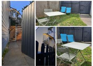 een tafel en stoelen naast een hek met een tafel en blauwe stoelen bij Le3BisMyosotis in Massy