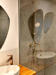 Ein Badezimmer in der Unterkunft Gîte urbain L'Oneux