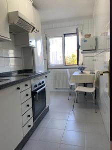 Kuchyň nebo kuchyňský kout v ubytování Piso céntrico VUT-5891-AS