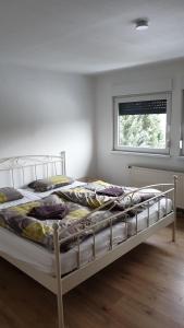 Ein Bett oder Betten in einem Zimmer der Unterkunft Wildemannstraße X
