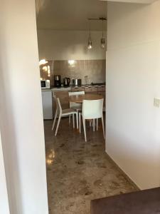 Kuchyň nebo kuchyňský kout v ubytování Casa Mela