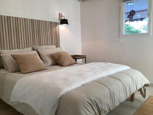 Postel nebo postele na pokoji v ubytování Casa Mela