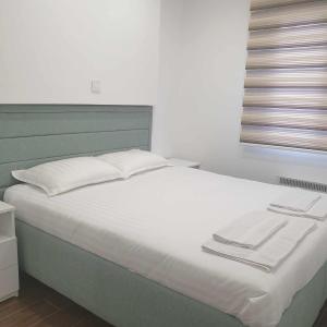 Кровать или кровати в номере M Lux Apartment Zlatibor