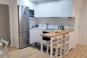 A kitchen or kitchenette at Apartamento Playa del Con